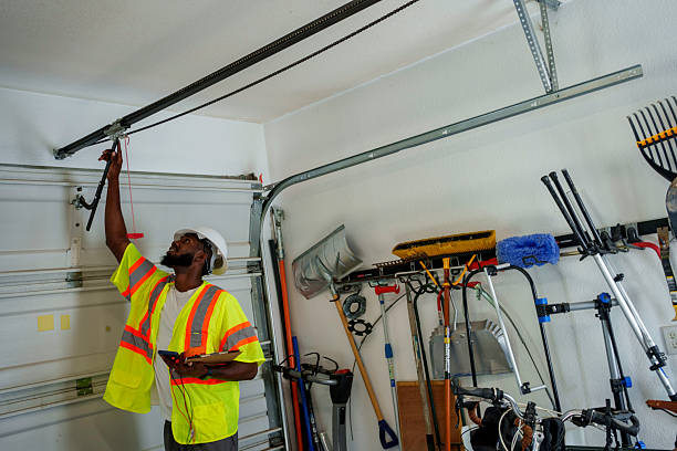 Professional Garage Door Roller Replacement technician working in Lake Grove, NY